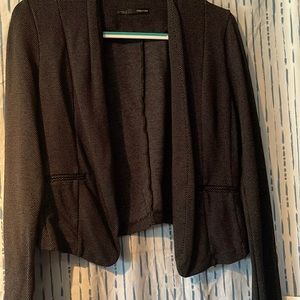 Blazer, black with very tiny grey dot pattern.
